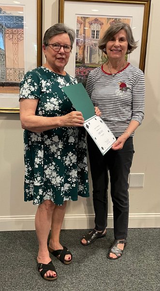 Sandy Cooper honoring Carol Duren for 20 years as a volunteer