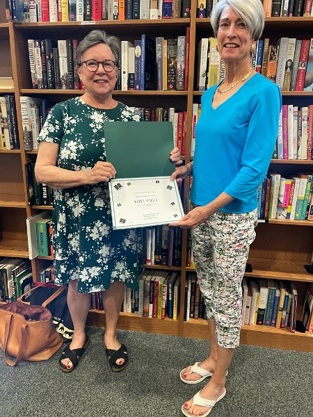 Sandy Cooper honoring Karen Sellick for 20 years as a volunteer